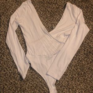 Plunging neckline bodysuit